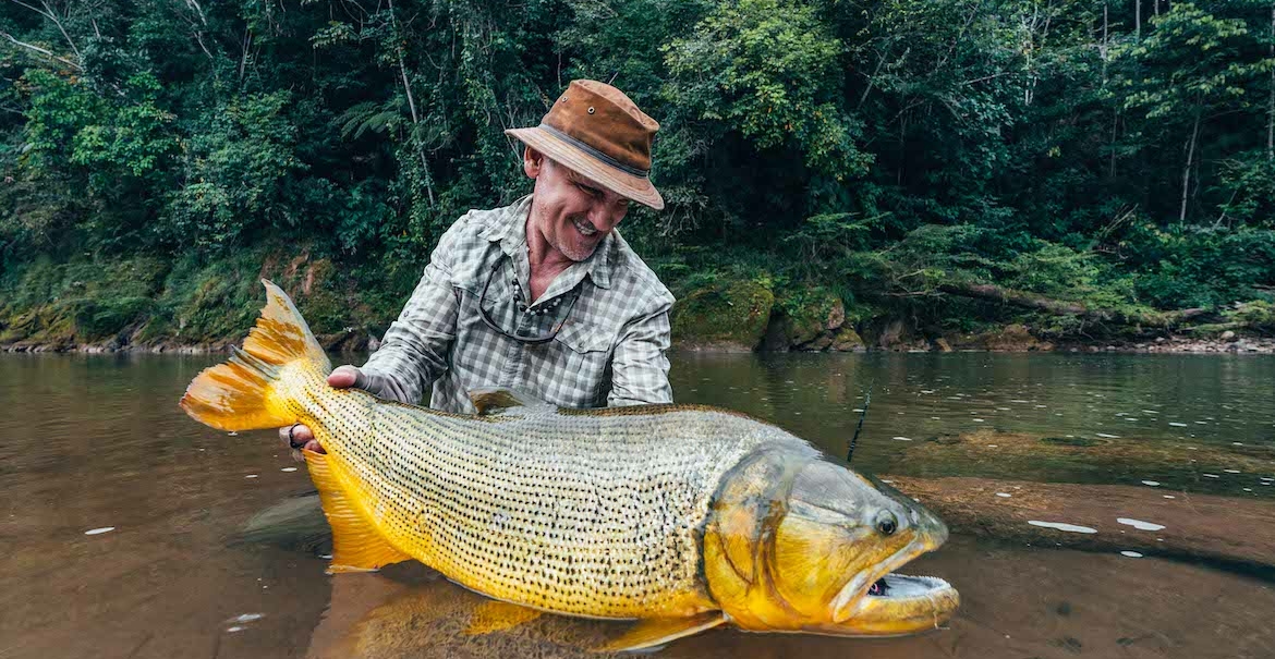 Fly Fishing in Bolivia for huge golden dorado fish - Gabriel Coimbra photo